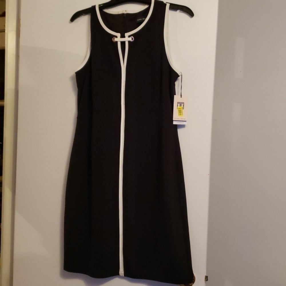 Classic black dress with white piping